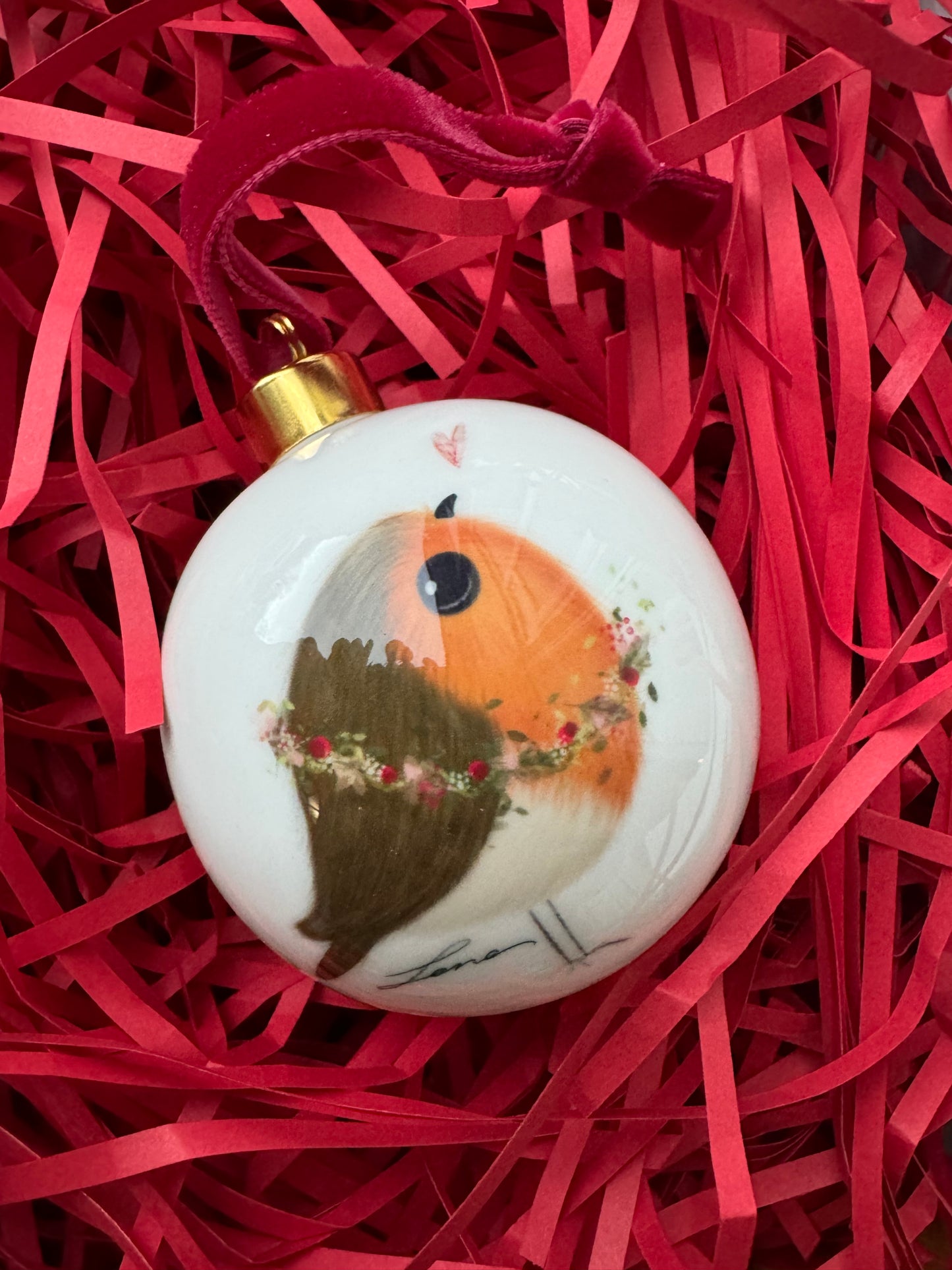 “ Seasons Tweetings” Bone China Robin bauble by Toni Lane