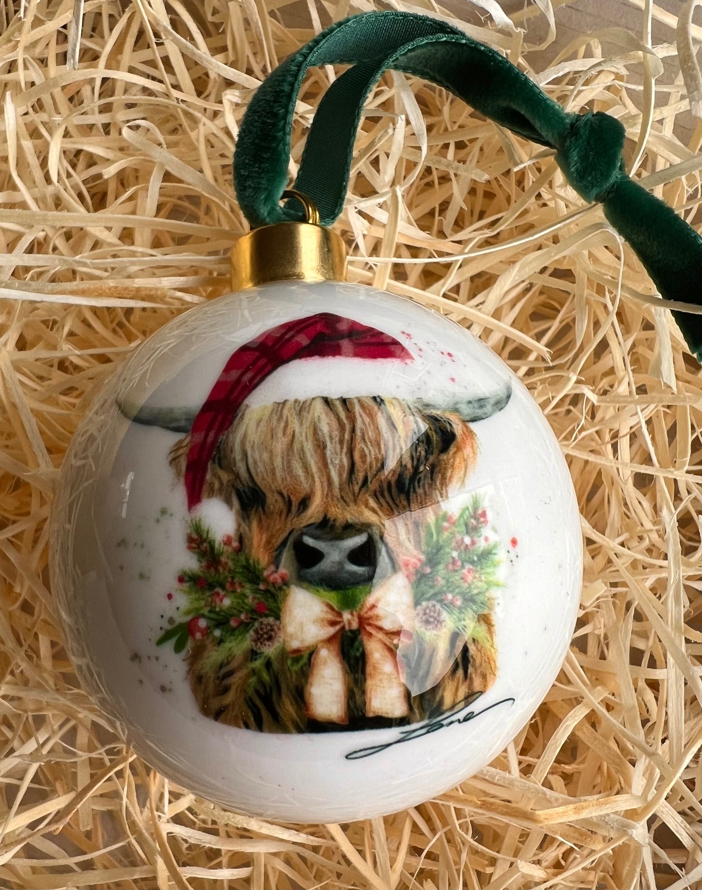 “Christmas Coo” Bone China Highland cow bauble by Toni Lane